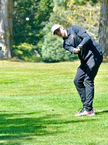 Contributed photo
Senior golfer Deston Dupuis pitches onto the eighth green at the Lopez golf course during the match with Mount Vernon Christian, April 27th.