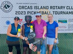 Contributed photo
The 2023 womens doubles gold medal winners Donna Laslo and Rosedanie Cadet hold their pickle-jar trophies; mother and daughter team Barb Skotte and Monica Connell with their silver medal gift bags.