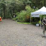 WDFW district biologist Kurt Licence and BLM staff at the kiosk near Watmough Bay on southern Lopez Island.