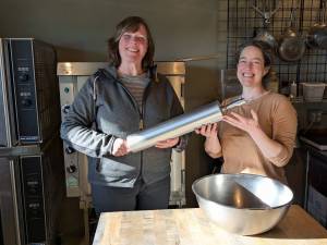 Gretchen Wing photo
Stephanie Smith passes the rolling pin to Margot Case.