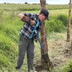 Mike Rosekrans photo.
Nolan Wall, along with other Youth Conservation Corps crew members from San Juan, was pictured working on building a beaver dam analog to slow stream flow and restoring wetlands at Zylstra Lake.