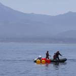 Contributed by The Whale Museum and Cascadia Research Collective.
Responders work to free the whale.