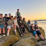 Contributed photo.
The San Juan Island YCC crew enjoys a Patos Island sunset after a full day of work.