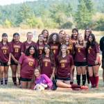 Lolo Meissner photo.
Back row, left to right: Lulu Velazquez, Danna Aquilar-Clavel, Ava Bennett, Fatima Velazquez, Ema Nehtal, Penny Spreine, Iris Ervin-McLean, Ayla Rick, Rosa Charnley, Maggie Rose and Audrey Roush. Bottom row: Evelyn Aguilar-Clavel (C), Kaileah Poole (C), Mae Krantz and Naima Garcia (C). Coaches: Tommer Roush (far left) and Galen Westervelt (right).