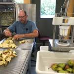 Jim Birkemeier processing pears at Taproot Kitchen.