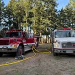 Contributed photo.
Firefighters at the scene of the fire.