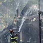 Contributed photo.
Firefighters work to contain the fire.
