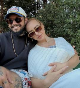 Gui Silva and his wife, Rachel Leidig with their newborn.