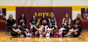 Aaron Johnson photo.
Left to right: Assistant coach Jessie Patrick, Evelyn Aguilar Clavel, Elsie Learing, Betty Burt, Kylie Willemsen, Dani Arnott and head coach Karrie Warner.
Front Row: Fatima Velazquez, Donna Aguilar Clavel, Iris Ervin-McLean, Ellie Patrick, Aaliyah Keeler and Lulu Velazquez,