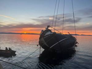 Contributed photos.
Aug. 13, 2022: The 58-foot fishing boat Aleutian Isle sank off the west side of San Juan Island, taking 2,500 gallons of diesel and a mass of nets and rigging down with it, generating a 1,500-foot slick right in the migration path of the Southern Resident orcas. IOSA was first on the scene, provided early reports to USCG and other agencies and supplied vital equipment to the massive multiagency multicontractor cleanup operation that followed.