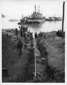 Photo courtesy of Bonneville Power Administration.
In 1951, Bonneville Power Administration engineers completed the installation of a 7.5-mile, 25,000-volt submarine power cable connecting Anacortes to Decatur Island, which was the worlds longest underwater power line at that time.