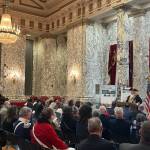Annika Hauer photo.
A reenactor of George Washington read off a letter the Founding Father once wrote, in the State Reception Room where the celebration was held.