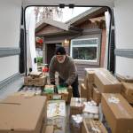 Darrell Kirk photo.
Burke Mulvaney loading up his delivery truck.