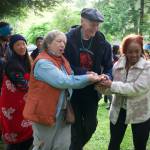 Darrell Kirk photo.
Gathering of community in Olga for the Gathering of the Eagles canoe voyage in 2025.