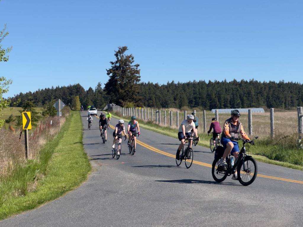 Darrell Kirk photo.
Bikers round the curve at the Annual Tour de Lopez.