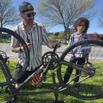 Darrell Kirk photo.
Dave and Bija Andresen get the bike ready.